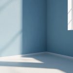 A blue room with beautifully repaired and painted corners. Corners repaired with paper tape.