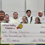 Matthews' Painting Company staff awards the 2025 Young Entrepreneur Scholarship Winner.