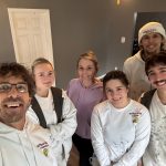 Matthews' Painting crew members with Paint It Forward recipient Kendall Rogers in Warsaw, Ind.